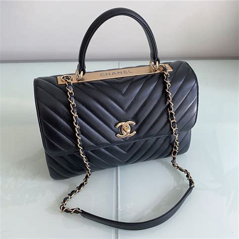 chanel chevron top handle bag|Chanel Chevron resale.